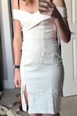 To start I want to say that my photos do not do that dress any justice, but wanted to show what it looked like on a petite pear shaped body. In addition to being really soft and very comfortable it fit like a glove, which rarely happens for me! After being steamed or ironed and a strapless bra this dress is sure to turn heads! I couldn't be more happy with it! - Sophia D.