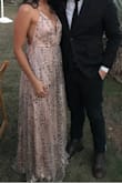 This dress is a dream to be in! I'm in love with it! I purchased a small but I should have gotten an extra small, the bust area was a little too big for me and I had to get it altered. I am also an A cup. It Is a long dress and dragged on the floor, even with my heels but I liked that about it. - Marina G.