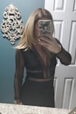 Very comfortable, but yes, sexy with the open back! I thought with the lace sleeves it would be a little itchy, but the sleeves weren't skin tight so it proved me wrong. I usually wear a small, but always size up in bodysuits, which worked out perfect! Definitely a great purchase! Can't wait to wear it again... - Vicky D.