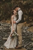 This dress is so beautiful and very well made! It is light and elegant with beautiful lace embroidery! I used it for my beach elopement, and was in love with the dress! After reading previous reviews, I decided to get one size smaller that I would normally wear and was very happy I did! The XS fit me like a small, and I honestly could have sized down again if there were such a thing as the bust area was a little baggy on me. Otherwise it was perfect! - Lindsay A.