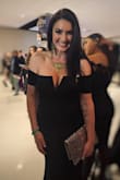 Wore this to the Grammys two weeks ago and it fit like a glove!  Hugged my every curve and made me feel so sexy and confident. I wore my comfiest platform wedge underneath (I needed height but comfort) and no one could tell which was even better. I order this in a small and medium since I'm always somewhere in between but found the small to fit perfectly. xo - Pegah H.