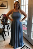 I got this for my brother's wedding because I'm a bridesmaid... the dress is pretty and good quality, it's just not ideal if you have a large chest because there's no support in the chest and the back is open and the sides cut in pretty far, so a bra isn't really an option. - Rachel R.