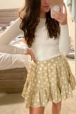 Love this skirt so much!! I was skeptical about the sizing since I am in between an XS and S, but I went with an XS and it fits great. Love that it has an elastic waist band. - Kaitlyn L.