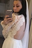 Ordered this dress for a Las Vegas elopement. I ordered a size small. It was way too big on my back, shoulders, chest and arms so I obviously had to get it tailored. I would order a size smaller than your usual. - Julie G.
