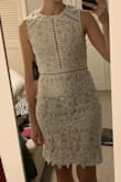 I got this dress for my bridal shower. It's a hint of blue and the lace is really pretty. Doesn't show any underwear lines. Only thing is the zipper in the back is long. - Georgette H.