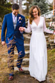 I absolutely loved this dress and received so many compliments. I had the sleeves taken in, as they fit a bit loose on my arms, but otherwise it fit perfectly. - Angela I.