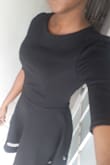 The fabric is simply amazing. What I really like about this dress is how well it fits almost like it was made just for me. It's super elegant, very nice black dress. - Vanessa G.