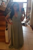 I was concerned about the color because I didn't think it would suit my olive skin but it did! I saw the sizing reviews and ordered a medium. Usually I am an Australian size 14 / L. It fits well. The only cons is that I will get it tailored because of the length and the cleavage! You'll need to get it tailored if you're under 5'4 because it's long. The slit along the leg also ends just above my knee so I'll be cutting it higher. I will also be reducing the amount of boob I see because it even showed the rib bit of my bra! Overall, it's a lovely dress! The fabric is perfect for all seasons. It's not itchy (and I have eczema) and it flows perfectly. The fabric is heavy so it wouldn't blow away too much in the wind. If you're not American just prepare yourself for the exchange rate! - Audrey M.
