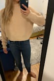 Love this sweater! The color is really lovely, the material is warm and ridiculously soft. Only docking it a point because it started unraveling the first time I wore it, but I was able to sew it up alright. - Allie G.