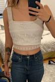 Love this! I originally ordered a small but it was too big, so I returned it and ordered an extra small once it was in stock. Really great for summer days and festivals! The quality is really nice and once I got the extra small it fits really comfy. - Allie G.