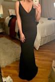 This dress is a staple. True to size, and was able to wear a regular bra with It for added push up. I did have to get It shortened (due to my height) but otherwise a great fit. The material is a bit stretchy and lightweight, making It able to be worn in all seasons. Love It and will Definitely be wearing It many times. - Kristen B.