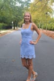 I am so happy that I bought this dress! It is a cute and fun design with a great color. I bought this for my college graduation and also wore it to a wedding; it was perfect for both occasions. Only thing to be aware of is you can only wear certain bras with it so they don't show from the square neckline. Not a lightweight dress (not too heavy either) because of the liner and lace overlay. - Kacy T.