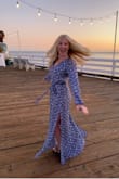 Dress definitely runs big, I never buy anything in an XS, more like a small or medium typically but this fit perfectly! - Emma B.