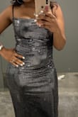 The dress was fitting but the sequins did fall off a lot. The straps were ill fitting because the straps were irritating my skin because of how it was made but overall the dress was cute. - Vivian P.