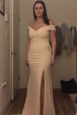 This dress fit really well; the sizing was appropriate. I really liked the material as it gave a little stretch, but ultimately, decided the construction wasn't working with my body type. I was limited in being able to raise my arms and I'd have to maintain 100% upright posture all night or risk spilling out of the top. I wanted to try something new but know I need the support. Would definitely recommend if you are comfortable in this style since it is really pretty and classic. - Brittany F.