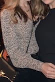 Pretty long sleeve with adorable buttons! A little low cut. Great quality. - Rosalia S.
