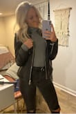 Great black leather jacket. I've tried other jackets that don't fit as well as this one does. Only con is the silver is VERY silver. I am not a fan of the shine but it's still cute. Have gotten compliments. - Mackenzie T.