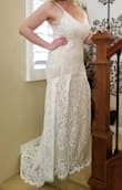 I had spent hours and hours shopping online for an affordable dress that would still make me feel beautiful on wedding day (having a very small and simple ceremony). I am now OBSESSED with Lulus. I love all of the customer photos in the reviews and this was extremely helpful when finally choosing this dress.
No one could believe this dress was $100. My only gripe is the adjustable strap, I think it looks a little tacky. BUT, for the price of this dress I could easily have it altered with a new strap and still have room in my budget $$$. I'll likely wear spanx to suck everything in for that special day but I could not be happier with the quality of the dress, especially for the price. The lace is gorgeous and it is LONG. I'm 6'0 and it's still overly long in the front and has the little train in the back (I also got a size XL). Shorter ladies might need to get it hemmed if you're not wearing high heels? All in all, you can't go wrong buying this dress. It's a beauty and I can't wait to wear it. - Carley H.
