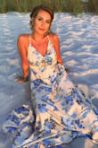 I got this dress to wear as maid of honor for my moms wedding. The blue and champagne colors were perfect for a beach wedding. I felt great in the dress, it was very comfortable. I probably had it altered to take it in around the waist and hemmed but I went with a M go play it safe. - Lindsay M.