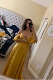 Beautiful dress but sadly had to return because the little snap to hold your bust in kept unsnapping. I wouldn't be able to sew it together either because of the lack of fabric. - Hayley S.