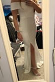 I am usually a medium across the board but I got a large and I'm glad I did. The medium was tight and it's for my rehearsal meeting so I want it to be more elegant than sexy- but I think it captures both. Not lightweight at all but I like that- it's sturdy, strong material. Well made. - Julie W.