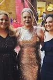 It was long and because of the sequins I would have had it professionally hemmed, which I didn't have time for, but with heels it wasn't bad. The dress Itself was beautiful, and I was able to wear a bra with one of those hooks that made it racerback. So many compliments! - Kim R.