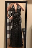 I purchased this (and the red one just like it, but  in a bigger size) to wear to Mardi Gras Balls. The quality is worth much more than I paid for it. The mesh area on the chest is nude and matched my skin tone, as you can see from the photos. The cut wasn't too low either, which I was nervous about. It looks fantastic and I can't wait to wear it to the ball next year. The fit is true to size. I got the black one in medium, and red in a large. I'm currently in between sizes, but the red was a better fit for me at the moment so that's the one I wore to the ball this year. I did have to alter the length In the red one because it was too long for me, as most dresses are, because i am 5'4 and I don't wear heels. If I did, it would have been fine. However, on this black one, the length is perfect for flats or heels without any alterations needed. Perhaps they add a little more length to the sizes as they get bigger? I don't know. Either way, I absolutely recommend it! It's gorgeous. - Niki A.