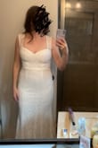 I love this dress. It was a bit long so I have to alter it for my wedding. I also shortened the straps. It's comfortable and stretchy and shows off my curves. It's perfect for all body types. - Amanda M.