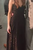 I had a lot of trouble finding a dress because I am very picky and I literally didn't like anything. I wanted a simple black dress and this one was perfect for me because it has a nice V cut, and a beautiful glitter-lacy top layer. Its a simple but elegant black dress. It fits really nicely. I got a lot of compliments and it looked great on pictures. I was also very surprised with the fast shipping, quality and right sizing (the dress fitted me perfectly). - Katarina P.