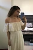 I was a bit nervous because it's a strapless dress and typically strapless dresses fall down on me. I ordered a size small despite the fact that I'm normally a medium in clothing. I wanted to have a more snug fitting dress so that maybe it wouldn't slip if it hugged me a bit tighter. I'm glad I got a smaller size than usual because it actually fits how a dress should, and not like the snug fit I was going for. I'm fine with the size though because it actually holds up really well in the arm region.
Also, it has arm holes and it's not like some wimpy piece of fabric that hangs over your arm. It's actually thicker, with multiple layers of fabric. It's really beautiful! The entire dress feels heavy and really great quality. It's a super long dress though. I tried it on with platform heels and it was still dragging on the ground. Overall, I absolutely love it! I'm really glad I went with this one. - Bianca L.