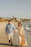 I had to get the dress altered to remove some of the length but other than that the dress fit perfectly. The sleeves were also a tad bit long but nothing too noticeable. - Elizabeth M.