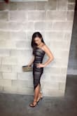 LOVE this stunning black dress!!  Adjustable straps make it so nice not to have to constantly pull up this tube style dress.  I'm 5'2" and the dress hit me right above the ankle in an XS.  Works perfect with a strapless bra.  

*****LULUS!!!!!!!!!!!:  PLEASE PLEASE PLEASEEEEE BRING THIS DRESS BACK IN RED IN TIME FOR VALENTINES DAY!!!  I need it!!!  Great buy, totally recommend!!! - MaryBeth L.