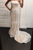This dress is gorgeous! Fits nicely (would like it a bit tighter but it's great nonetheless). The material is thick and intricate (not cheap looking at all). Can't wait to wear it for my bridal shower! - Maria S.