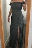 I got this dress to wear for a summer BBQ before my wedding weekend, and it is very cute on. The off-the-shoulder look dresses the print up a bit, and the shoulders are tight and secure. The materials is soft to the touch and the waist is flattering. I'll have to get it hemmed, but definitely a great dress! - Cara J.