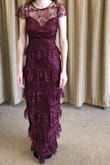 We weren't sure how this one would look, but very delicate and pretty in person. Had to get the top taken in a bit. Nice dress. Length perfect. - TANYA S.