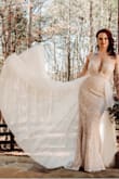 I had to get the top let out some but other than that it fit perfect and was beautiful for our wedding. I didn't take the extra skirt off, I loved the look of them together. - Jenn H.