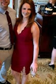 The material was perfect, I wore it to a friends wedding and got some great compliments! I am bustier up top so the dress was a little more open than expected. I wore a plunge bra to hide the front strap. Slit was not too high at all. Overall great quality for the price! - Breana M.