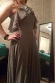 This dress is amazing! The quality is great too. It is very comfortable and easy to put on. The color is exactly like the picture. - Megan D.
