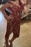 I really like the lace overlay and the neckline/off the shoulder design. The zipper is a bit hard to move though and some of the lace detached from the dress without having washed it yet. - Diana C.