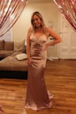 This dress was so comfortable and so flattering. The train was very elegant but not too heavy. Unlike most "silky" dresses this one had some stretch and didn't pull in an unflattering way. I felt amazing. - Christie L.