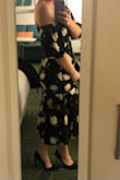 Unique style, felt sexy without showing too much skin. I had it taken in at the waist but everything else fit nicely. - Sara N.