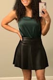I was hesitant to order this because I have a larger chest and sometimes the straight across cut isn't flattering for me. I'm so glad I took a chance with this bodysuit! The green is pretty, just like the photo, and the straps are adjustable. I didn't wear a bra and adjusted the straps to be a little tighter to ensure I didn't show anything. I would recommend ordering your typical size, but pairing with bottoms that are a little more high waisted. - Taneesha P.