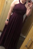 This dress is absolutely beautiful and fits amazing!!! It's true to size in every area!!! 
I am always worried about ordering online but was overly thrilled with this purchase! - April R.