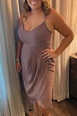 I absolutely love this dress! If I'm being honest, I wasn't hopefully because I typically order dresses and become disappointed once they arrive but I was pleasantly surprised and so was my husband! The color was perfect for a February wedding (and a little darker then in the picture). I typically wear a XL because I am busty ( a bit bigger then 36DDD) and I ordered a 1X, just because I rather take something in at the tailor then it not fit. It did not need anything done to it! I can't wait to have something to wear it again! - Jenna C.