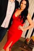 I was worried about this either being too tight or too lose. It was very flattering in the abdomen area and bust. It went pretty low but it was for a night out so I didn't mind. So happy I purchased! - Brittany H.