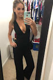 My apologies on the mirror selfie but this jumpsuit fits perfect in all the right places! I was concerned I would need to get it hemmed 3in like a similar Lulus jumpsuit but that was not necessary. It wasn't too long or too short and I am 5'8. My boyfriend couldn't take his eyes off me haha - Jessica H.