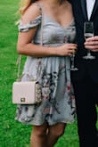 This dress fit perfectly! I wore it to an outdoor summer wedding and got so many compliments on it! It has adjustable straps (game changer) and the off-the-shoulder sleeves are loose and non-restricting. - Shelly C.