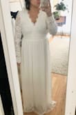 I really liked this dress, especially the scalloped lace details. The open back is gorgeous, but I'm not sure confident with how it made me look. Ultimately I decided to go with another dress, but really like this one a lot!
Keep in mind that the waist is tight and not very forgiving. - Ting T.