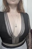 I am in love with this body suit. It is a little snug but fits well overall. It holds the girls in well. Definitely can't wear a bra with it (petals) but I've had so many compliments on it - Kayla S.