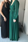 The color was beautiful and pretty accurate to the photo! The material is light so I hope I can wear it in the summer even though I bought it for a winter event. It was a little low cut for my taste but I put a safety pin in it and it worked perfectly! Definitely recommend. - Madison H.